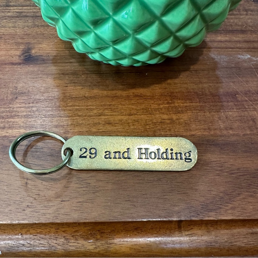 Russ Gold Key Chain with Engraved Design